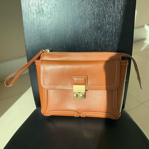 NWT Phillip Lim Pashli Clutch. Brand new with authenticity card. - Picture 9 of 10